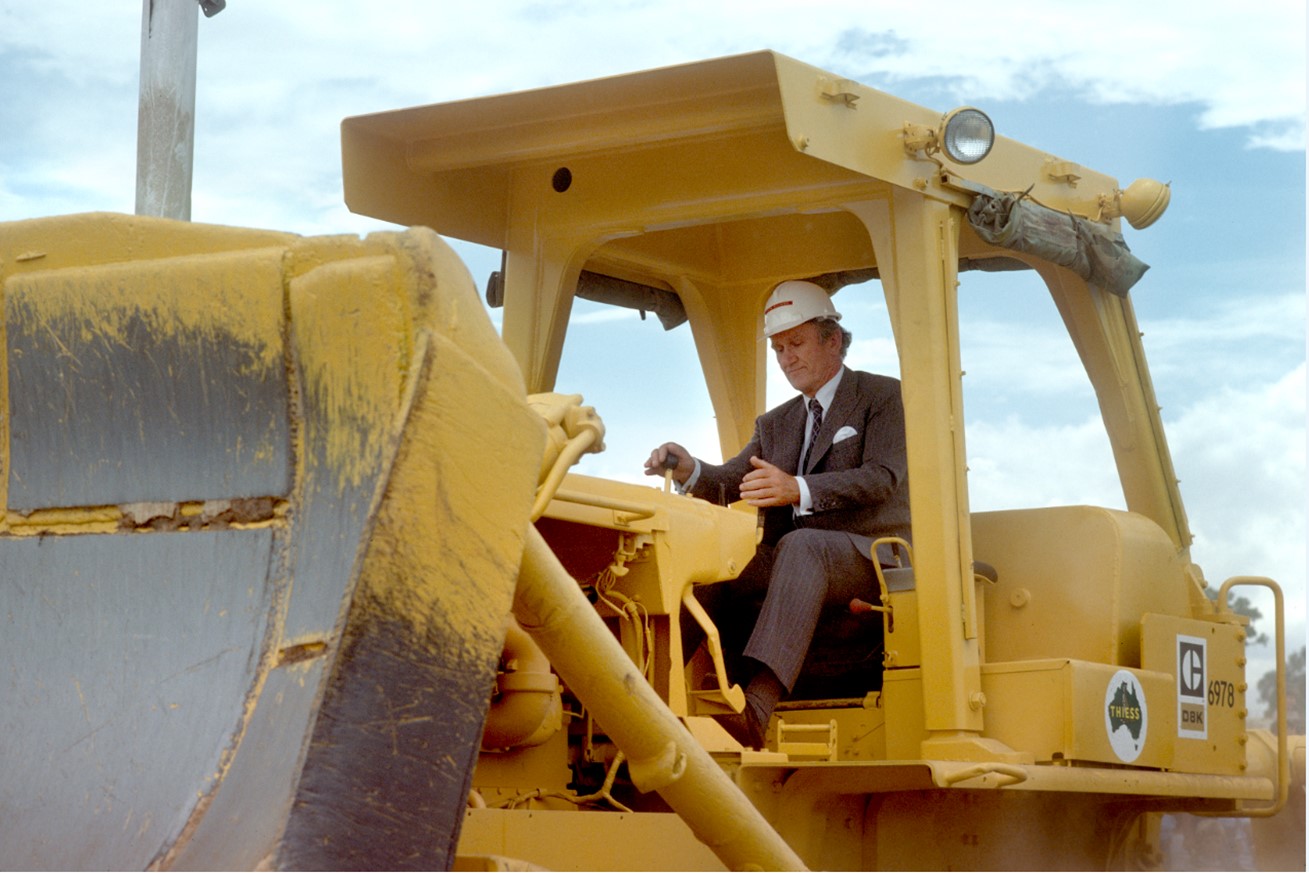 Prime Minister Drive Bulldover in Ceremony at New Parliament House – site, National Archives of Australia, A6135, K30/1/81/41