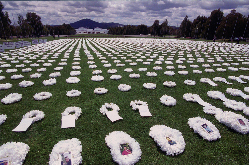 White wreaths laid on the Parliament House front lawns to mark the inaugural White Wreath Day, Image source: AUSPIC