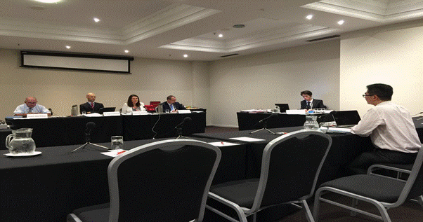 The committee speaks with Mr Jason Chuen, Chair of the Victorian Regional Committee and Fellow of the Royal Australian College of Surgeons, at a hearing in Melbourne on 4 November 2015.