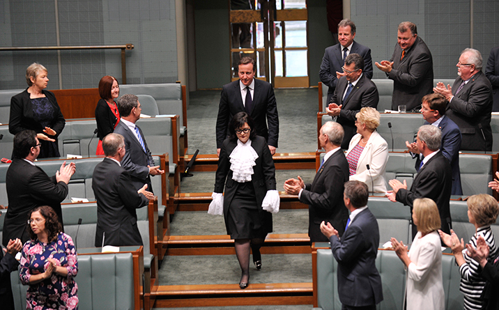 The Serjeant-at-Arms escorting the Prime Minister of the United Kingdom, the Rt Hon David Cameron, into the House of Representatives on 14 November 2014. Photo: David Foote AUSPIC/DPS.