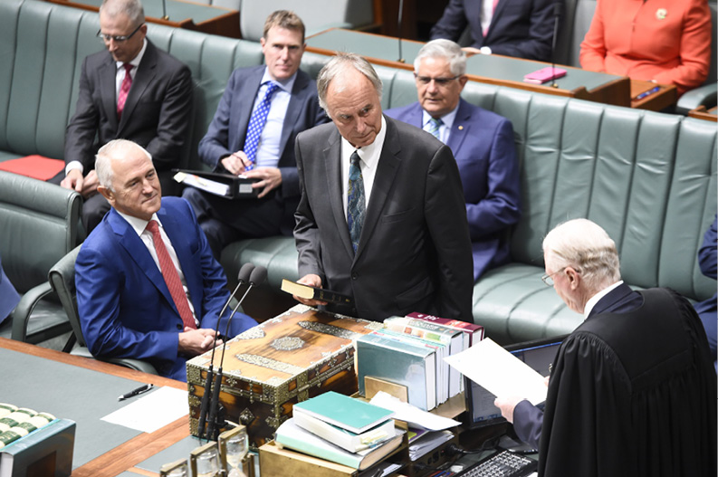 John Alexander being sworn in.