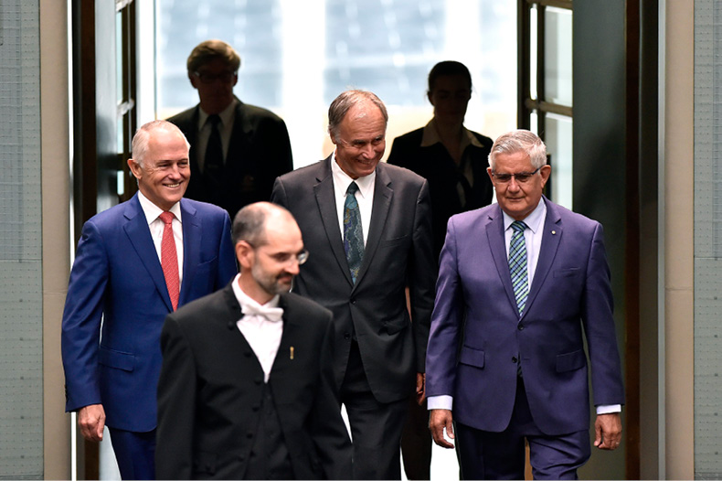 Serjeant-at-Arms admits the Prime Minister, the Hon Malcolm Turnbull, John Alexander and the Hon Ken Wyatt to the Chamber.
