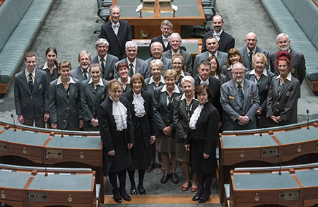 Photo of chamber support staff in the House of Representatives chamber.