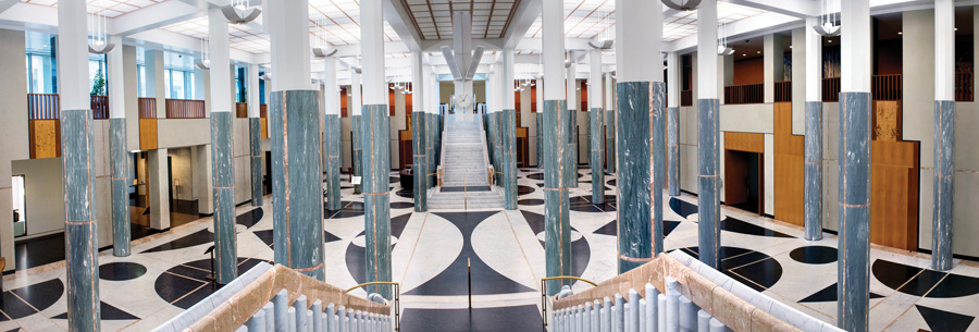 The Marble Foyer features 48 marble columns and 20 panels of inlaid timber