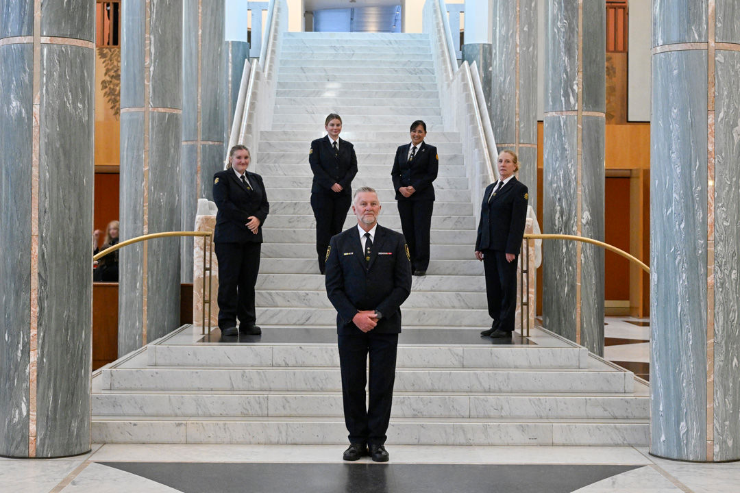 Five security guards standing in the Marble Foyer at Parliament House