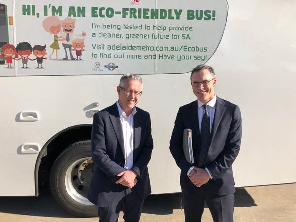 Photo 2: Senator Storer and Senator David Smith inspecting a fully-electric bus prior to the demonstration