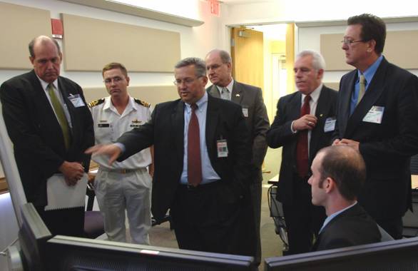 The delegation viewed a combat system demonstration at Raytheon.